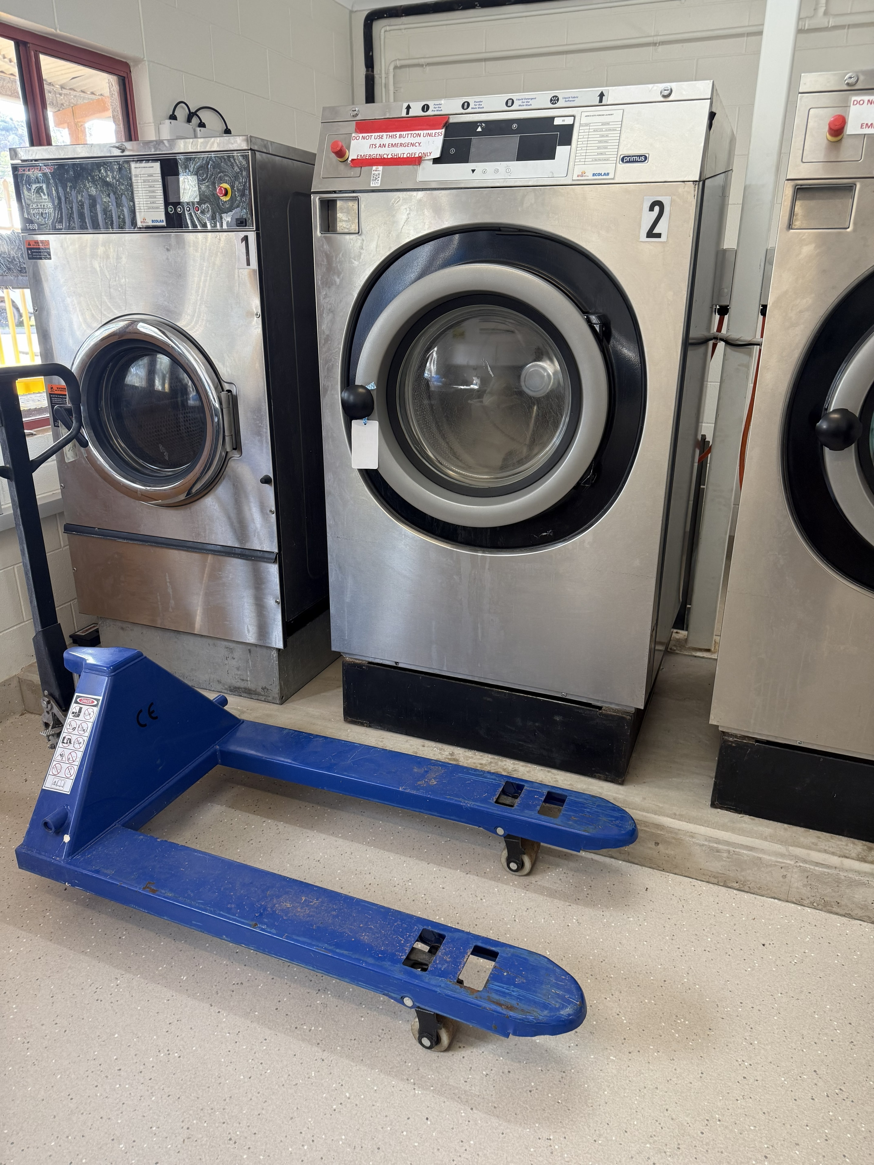 Commercial washing machines on site